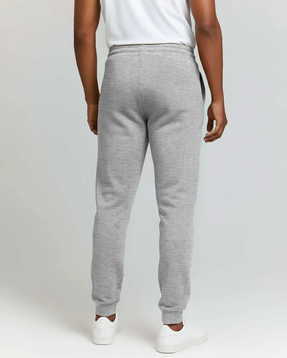 Real Essentials Tapered - Pantalones Deportivos Hombre